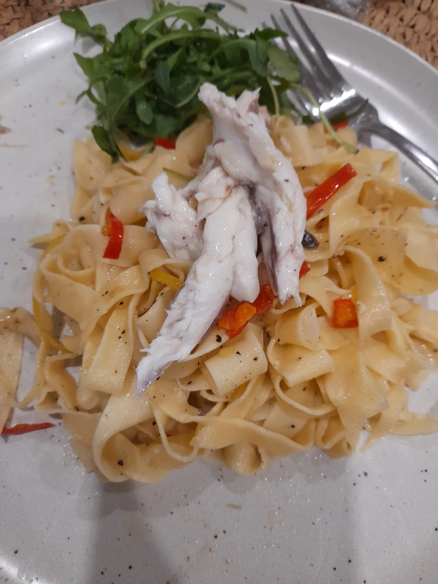 Plated up fish and pasta